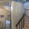 Elevador hidráulico de media cabina de fabricación nacional  para 2 niveles