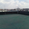 Impermeabilización con Prefabricado Copernit Italiano con gravilla roja en Azotea de Edificio.