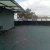 Impermeabilización con Prefabricado Copernit Italiano con gravilla roja en Azotea de Edificio.