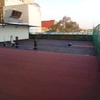 Impermeabilización con Prefabricado Copernit Italiano con gravilla roja en Azotea de Edificio.
