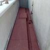 Impermeabilización con Prefabricado Copernit Italiano con gravilla roja en Azotea de Edificio.