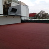 Impermeabilización con Prefabricado Copernit Italiano con gravilla roja en Azotea de Edificio.