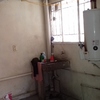 inicial en cuarto de lavado