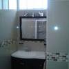 MEDIO BAÑO FORRADO DE PORCELANITE
