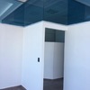 Oficina terminada con durock y cristales en tintex azul