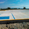 Pavimento en estacionamiento en cabecera municipal.
