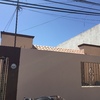 Pintura en fachada de casa