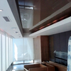 Plafond combinado con tablaroca y vidrio café